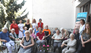 Group of elderly people outdoors.
